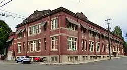 Photograph of a brick industrial building