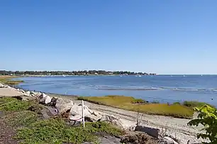 View of coastline from Fort Trumbull Beach, with Gulf Beach in distance