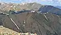 South aspect of Twin Peaks (centered) viewed from Mount Hope. Centered at the top in the distance are Mount Elbert and Mount Massive (the two highest peaks in Colorado and the Rocky Mountains).