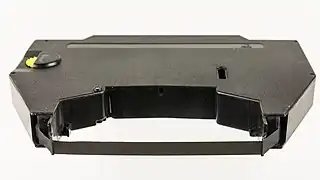 Typewriter ribbon cartridge with polymer tape