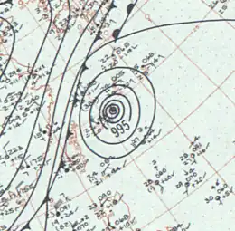 A surface weather analysis map of Typhoon Emma near Okinawa on October 12, with tight isobars surround the storm and an approaching cold front coming from continental Asia