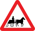 Horse-drawn vehicles likely to be in the road