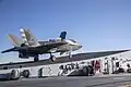 A USMC F-35B on the ski-jump of Cavour