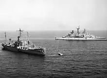 Little Rock standing by the stricken USS Liberty (AGTR-5), June 1967