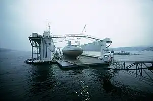 Sister ship: Los Alamos (AFDB-7), with a repaired submarine at Holy Loch, Scotland in 1985