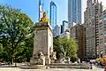 The USS Maine National Monument at the Merchant's Gate entrance to Central Park