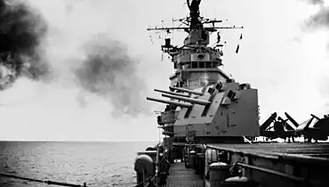 Valley Forge firing her forward 5-inch guns, in November 1949