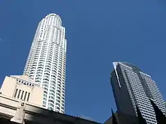 The U.S. Bank Tower towering over Central Library in Downtown Los Angeles