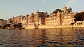 Wide angle view of the City Palace from the backside, also showing Pichola Lake.