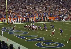 Teams in formation near the end zone