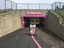 A pedestrian underpass crossing an access road