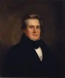 Portrait of Millard Fillmore dressed largely in black facing the artist