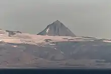 Pogramni (6,569 ft; 2,002 m) volcano as seen from the Unimak Pass in the morning light.