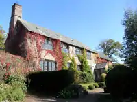 Upcott Barton Farmhouse including adjoining Front Garden Walls and Gate-piers to North-west and South-west