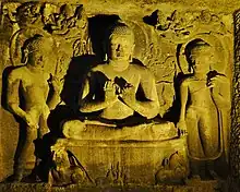 Buddha in the upper level, deer below and apsaras above (artificial lighting)