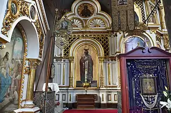 Theotokos of Kozeltshan on the right with jewelry donated by parishioners around it in 2017