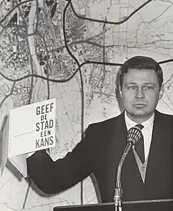 David Jokinen with a copy of his plan for Amsterdam. The title reads Give the city a chance