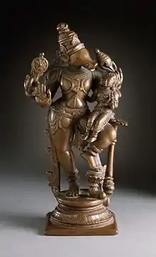 Bhudevi seated on Varaha's lap.