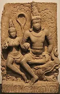 Varuna with Varunani. Statue made from Basalt and discovered in Karnataka. (8th century CE)