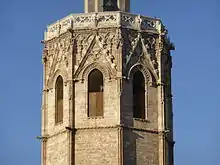 View of the top of the tower with the windows through which the bells ring