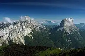 The crest of the Vercors on the left, opposing a single isolated summit