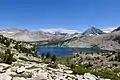 View south from near Cartridge Pass. Mt. Ickes to left, Pyramid Peak centered in the distance, Arrow Peak to right