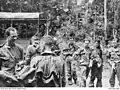 Legge briefing volunteers, North Brook Island, 1944