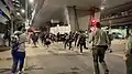 Supporters chasing the prison van outside West Kowloon Magistrates' Court