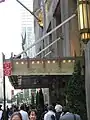 The hotel's name with the double hyphen, on the awning over the Park Avenue entrance of Waldorf Astoria New York