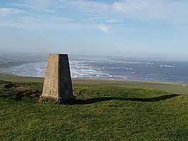 A high point overlooking a bay and a tidal sea