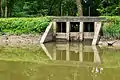 Waste weir. Note boards to adjust water height. The wicket at Pennyfield lock were open, draining the canal of water, hence, why the water level is lower than the boards.