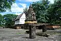 Two sets of Bai Sema surround the ubosot and a chedi at Wat Chet Yot, Chiang Mai