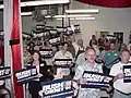 Members attend a watch party of the broadcast of George W. Bush's acceptance speech at the 2004 Republican National Convention