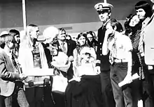 Butler greets his family in Tulsa March 1973