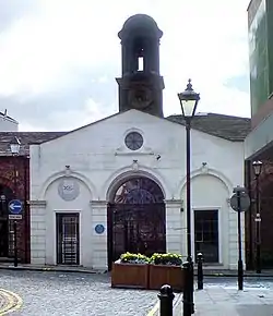 Remains of North West Range of White Cloth Hall including Entrance