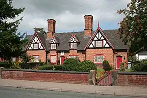 Tollemache Almshouses, 118–128 Welsh Row