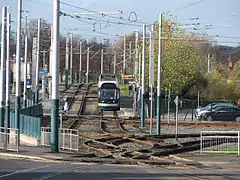 Complex trackwork to the east of the stop; depot access to right