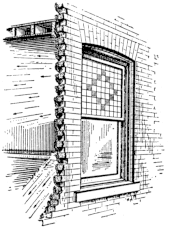 Transom light. The upper part of the window is made of prism tiles, so the light passing through them is bent.