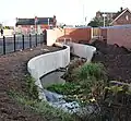 Curved feature beside Torkard Way