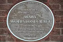 Brown plaque for Wollstonecraft at her final home, in Camden