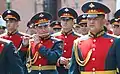 A flutist of the band in the summer uniform.