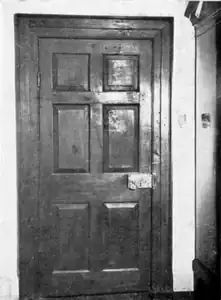 North bedroom door, 18th-century. One of the few remaining unmodernised parts of the north wing.