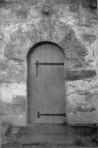 Original doorway in the east side of the original block, 16th-century.