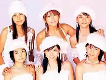 ZYX, 2003.Back row (L to R): Erika Umeda, Mari Yaguchi, Maimi YajimaFront row (L to R): Saki Shimizu, Megumi Murakami, Momoko Tsugunaga.