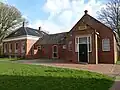 Former clergy house and meeting centre