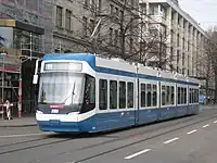 A Bombardier Cobra low-floor tram on typical VBZ street track