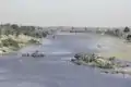 The Falémé River with bushes on its banks at the Mali-Senegal border, 1984.